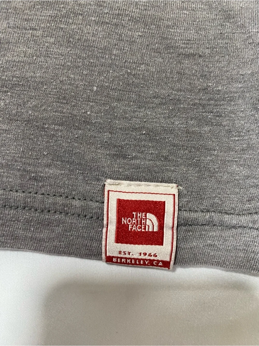 The North Face Men's Gray Logo Short-Sleeve Tee with Maroon and Blue Accents